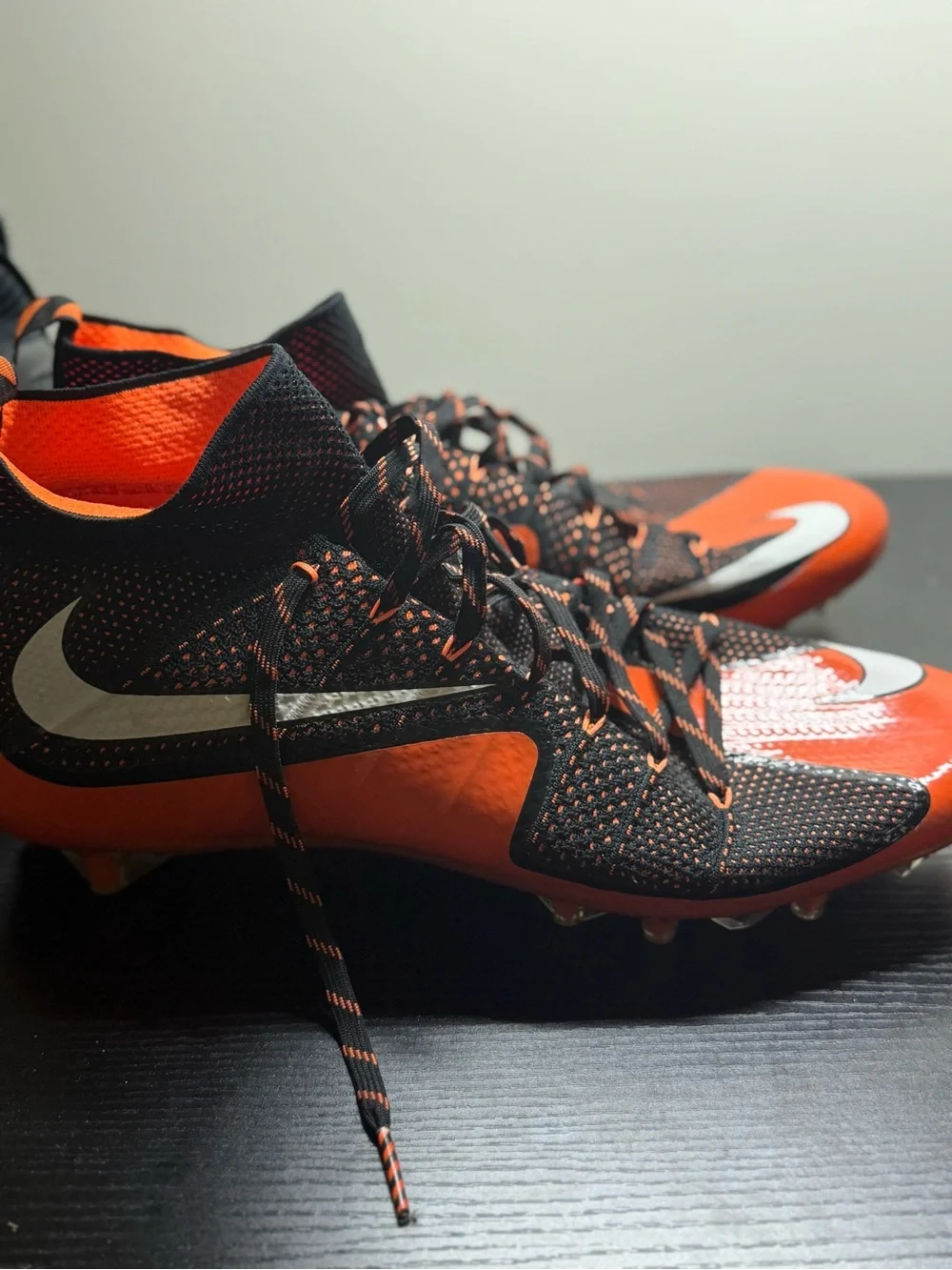 Nike Black and Orange Soccer Cleats with White Swoosh